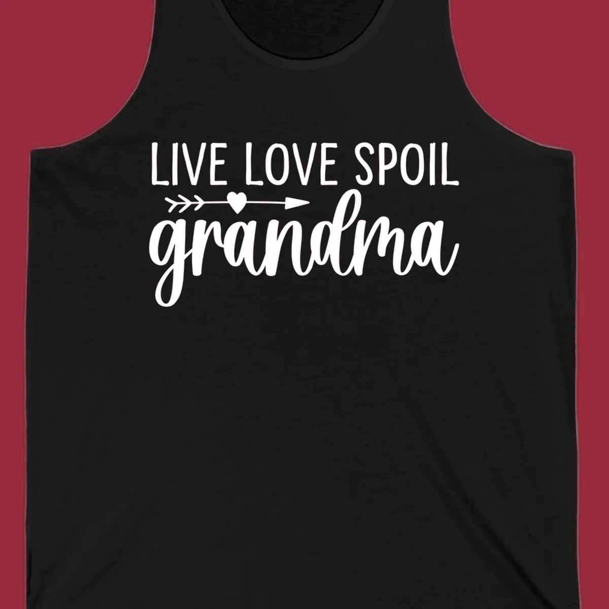 Live Love Spoil Grandma typography design with heart and arrow.