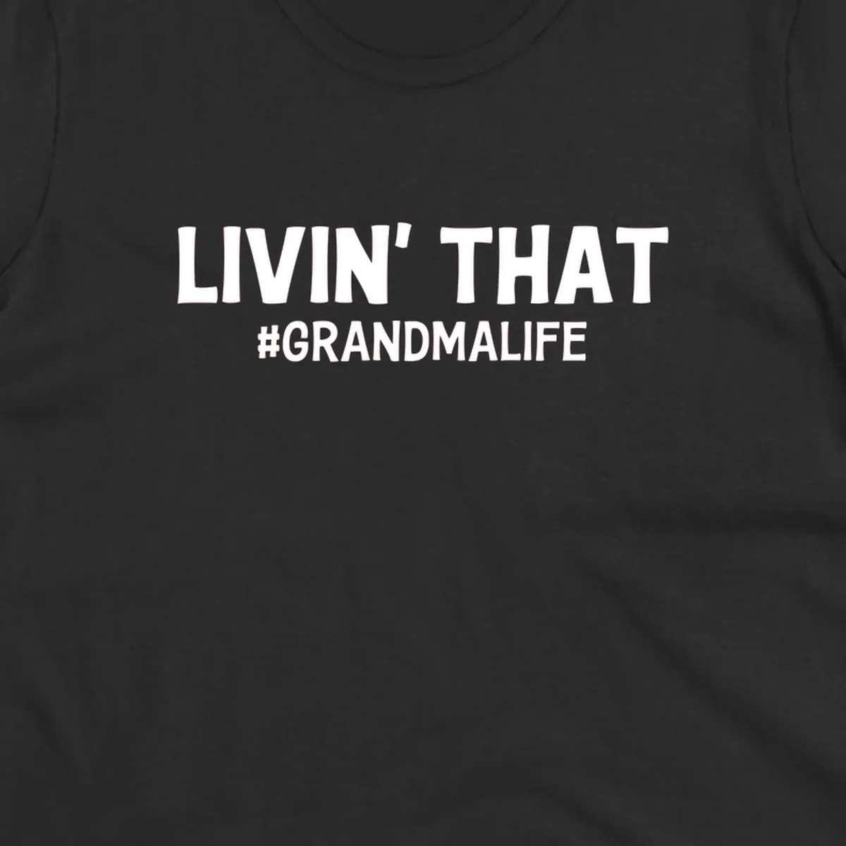Livin' That #GrandmaLife text design in white.