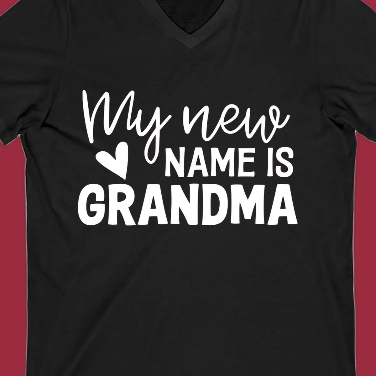 Text design announcing 'My new NAME IS GRANDMA' with a heart graphic.