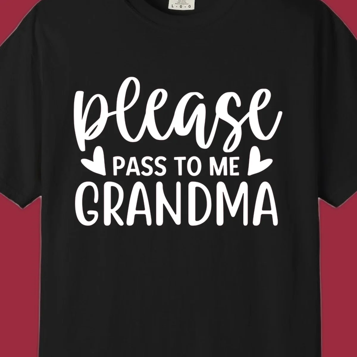 Grandma please pass me the snacks text design with heart accents.