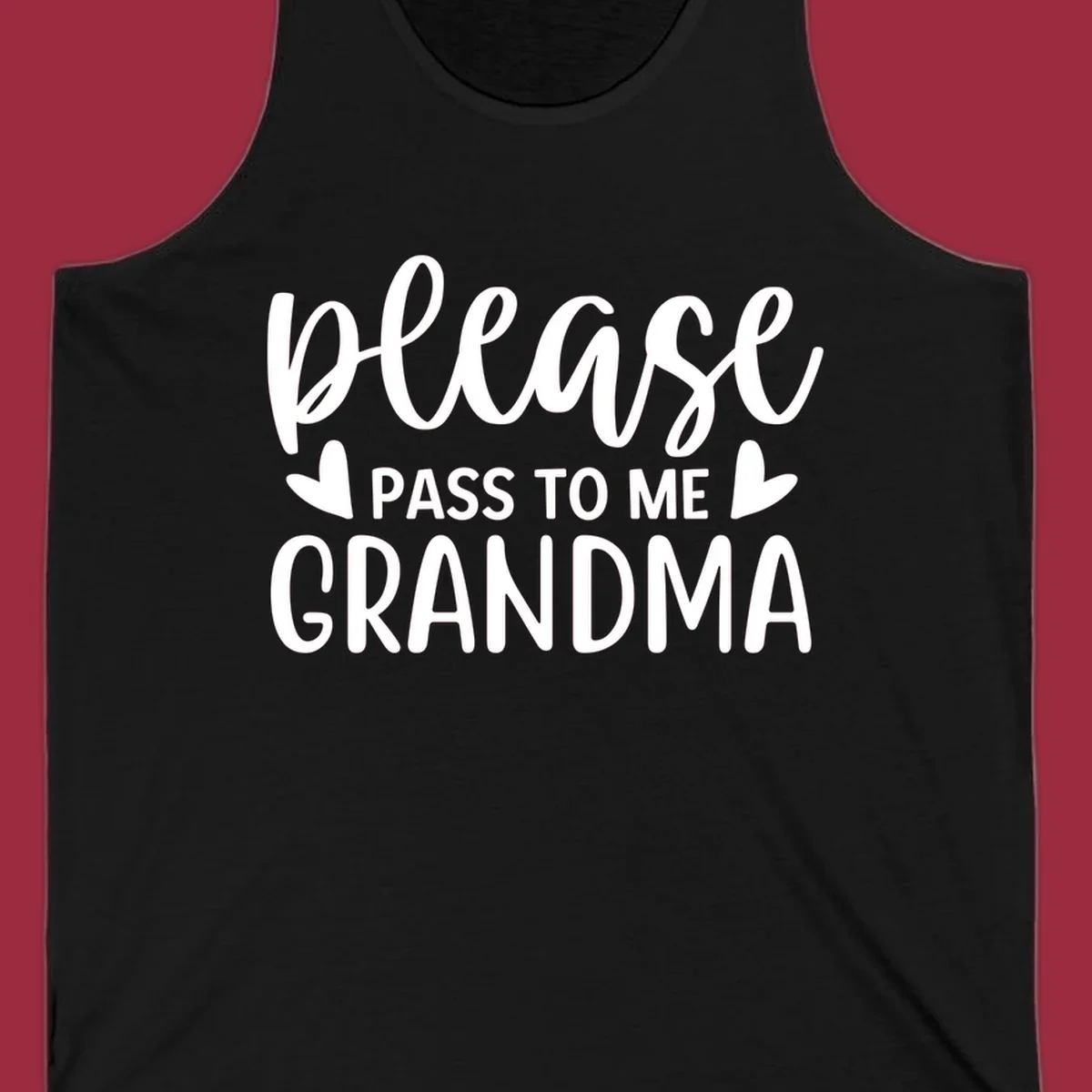 Grandma please pass me the snacks text design with heart accents.