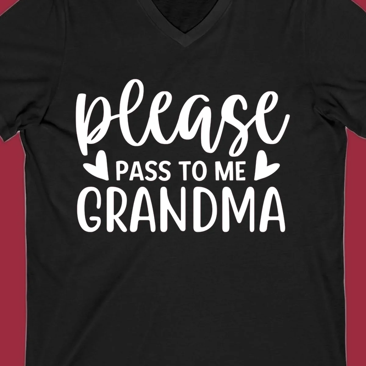 Grandma please pass me the snacks text design with heart accents.