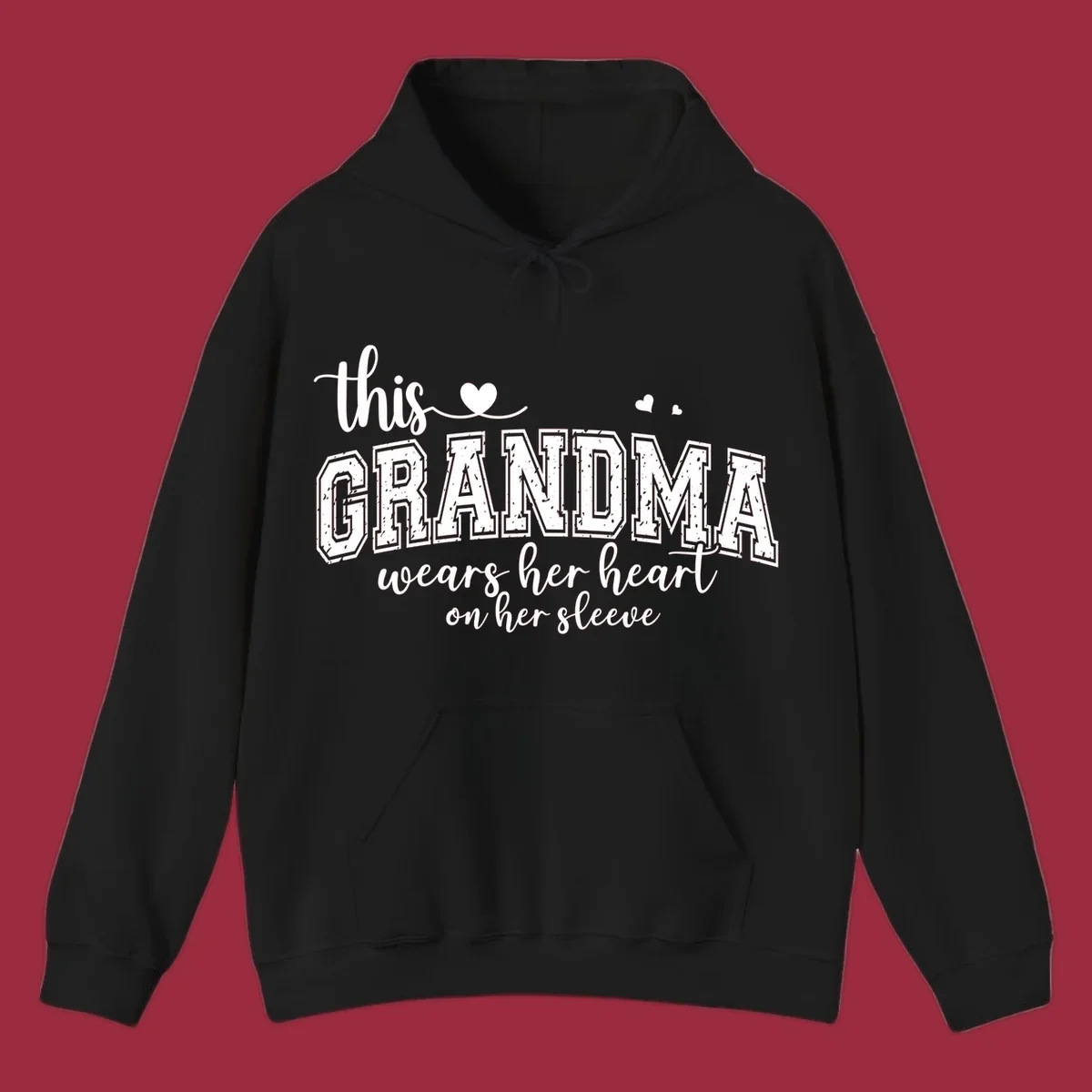 This Grandma Wears Her Heart On Her Sleeve text design with hearts.