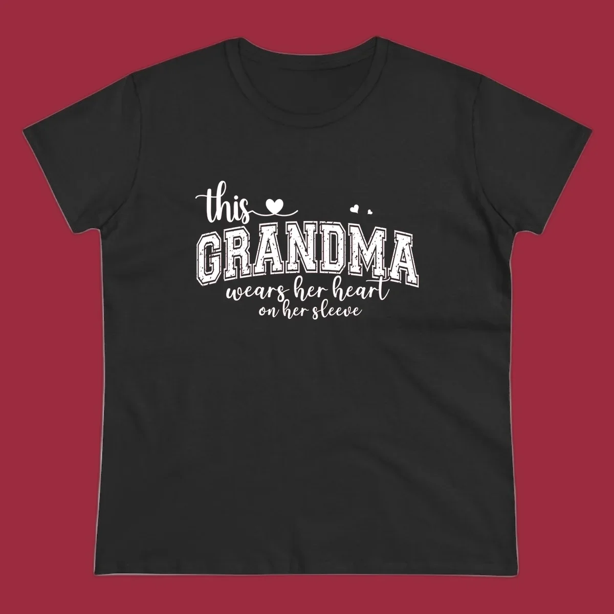 This Grandma Wears Her Heart On Her Sleeve text design with hearts.