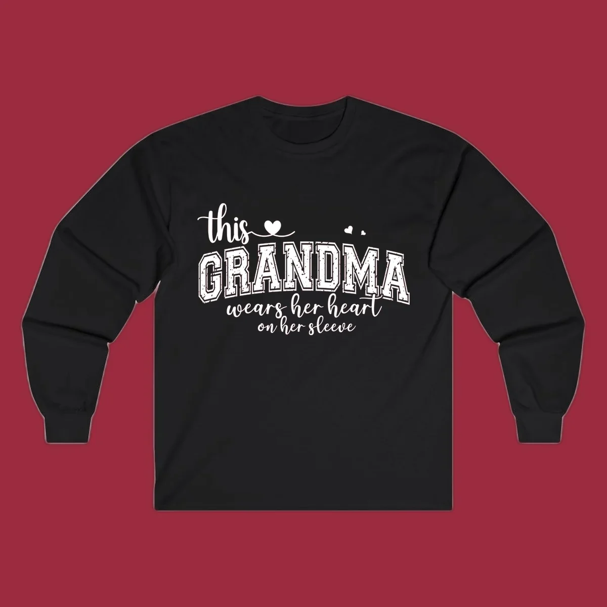 This Grandma Wears Her Heart On Her Sleeve text design with hearts.