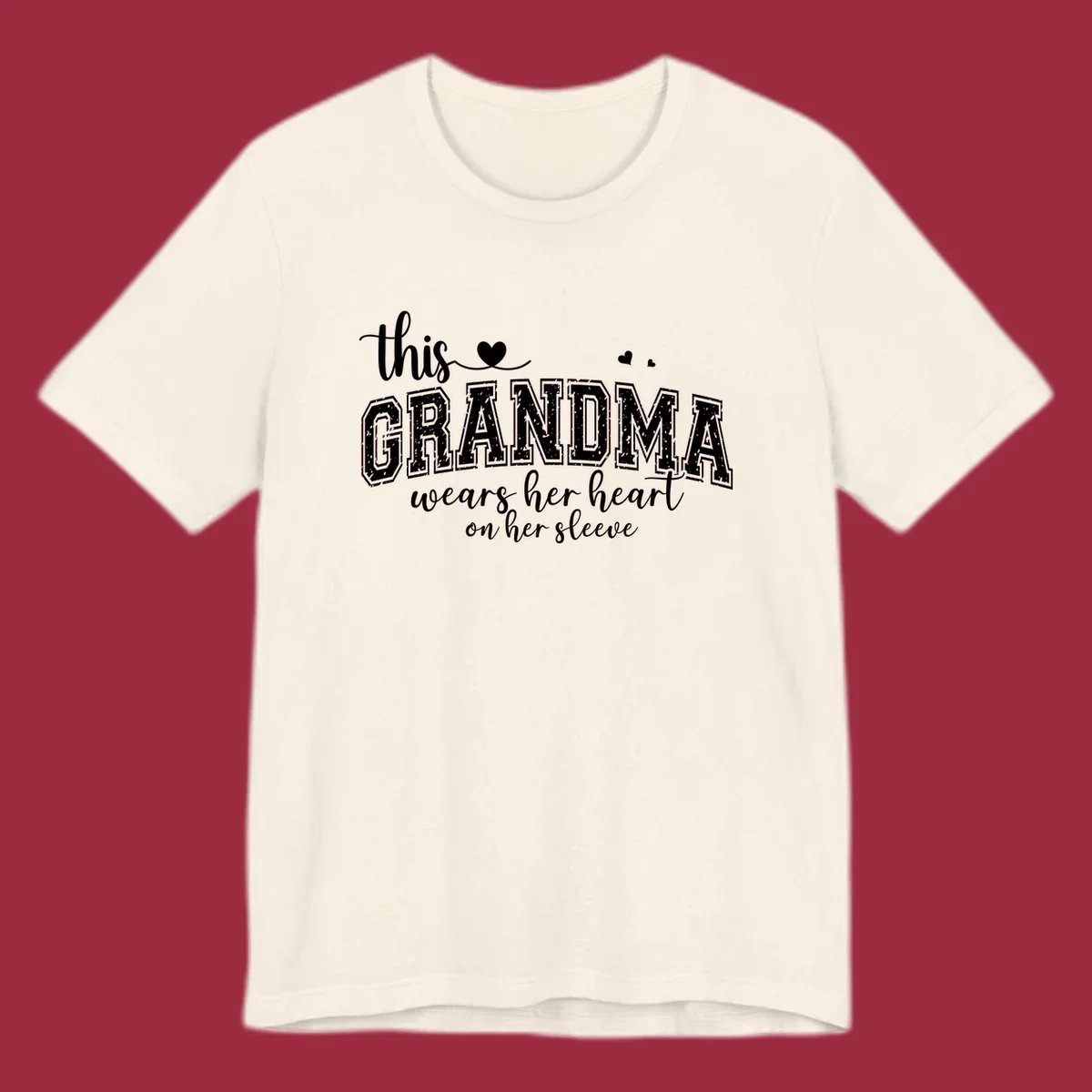 This Grandma Wears Her Heart On Her Sleeve text design with hearts.