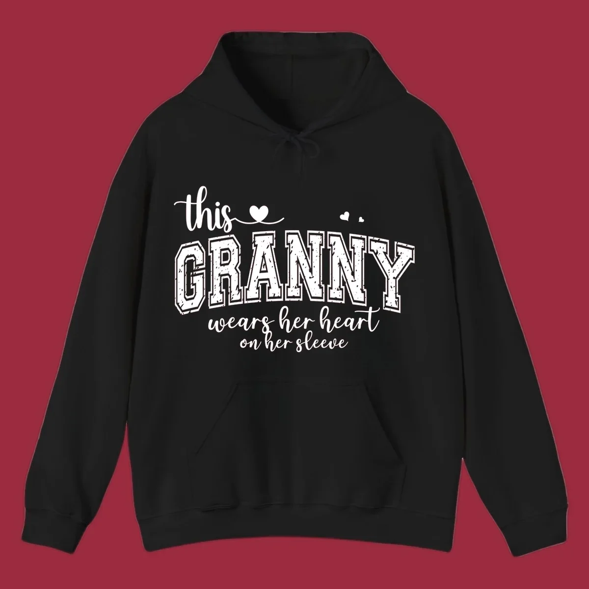 This Granny Wears Her Heart On Her Sleeve text design with heart graphics.