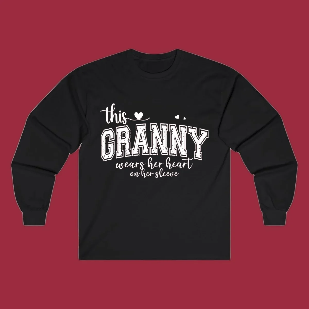 This Granny Wears Her Heart On Her Sleeve text design with heart graphics.