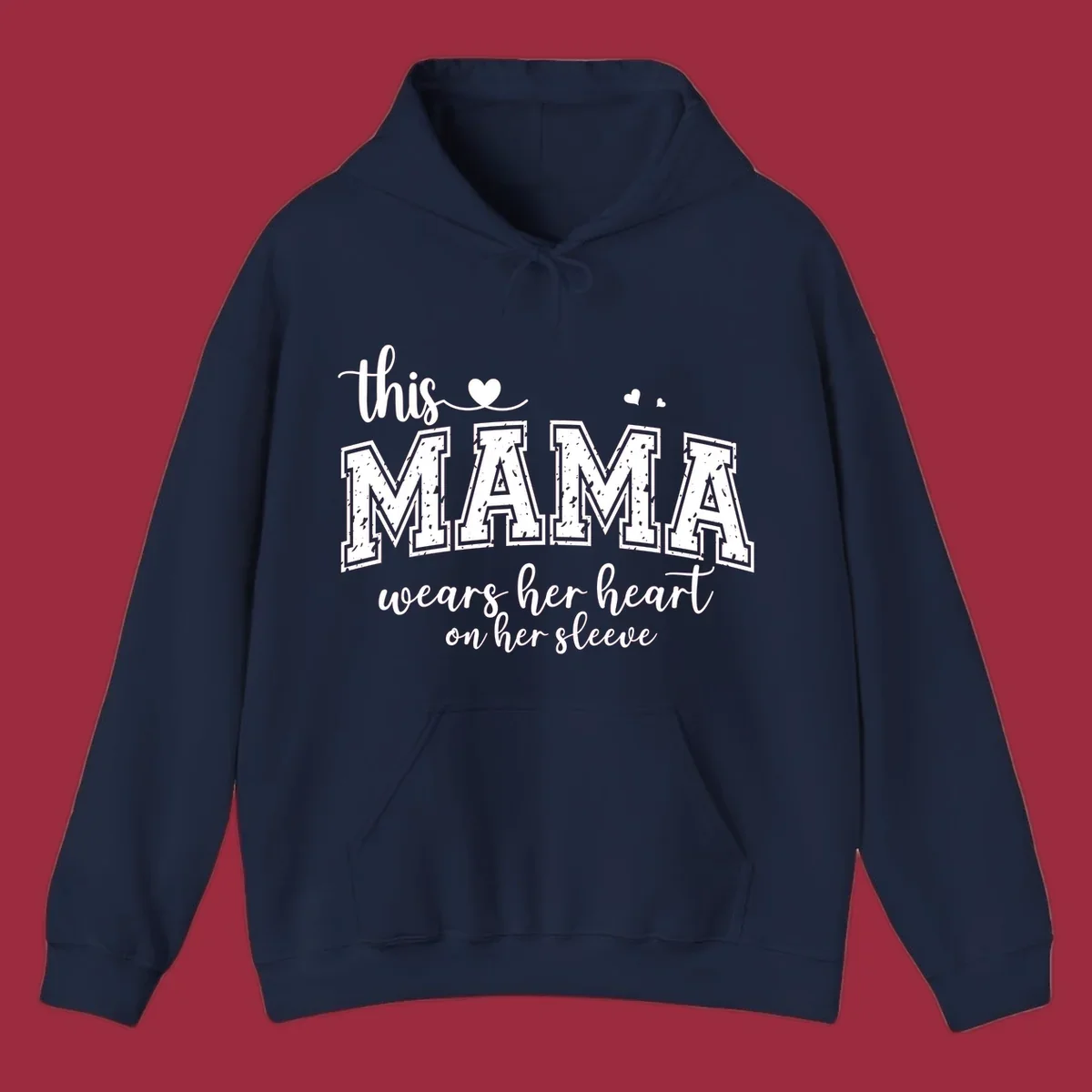 Mama heart on sleeve typography design with script and distressed block text and heart accents.