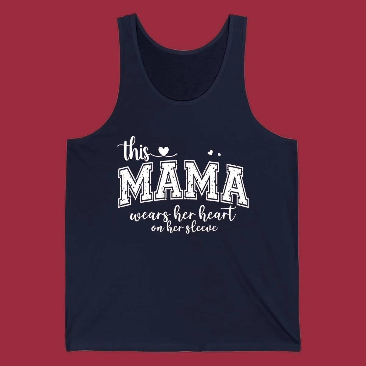 Mama heart on sleeve typography design with script and distressed block text and heart accents.