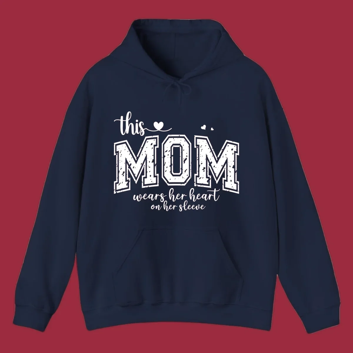 This mom wears her heart on her sleeve graphic with distressed text and heart icons.