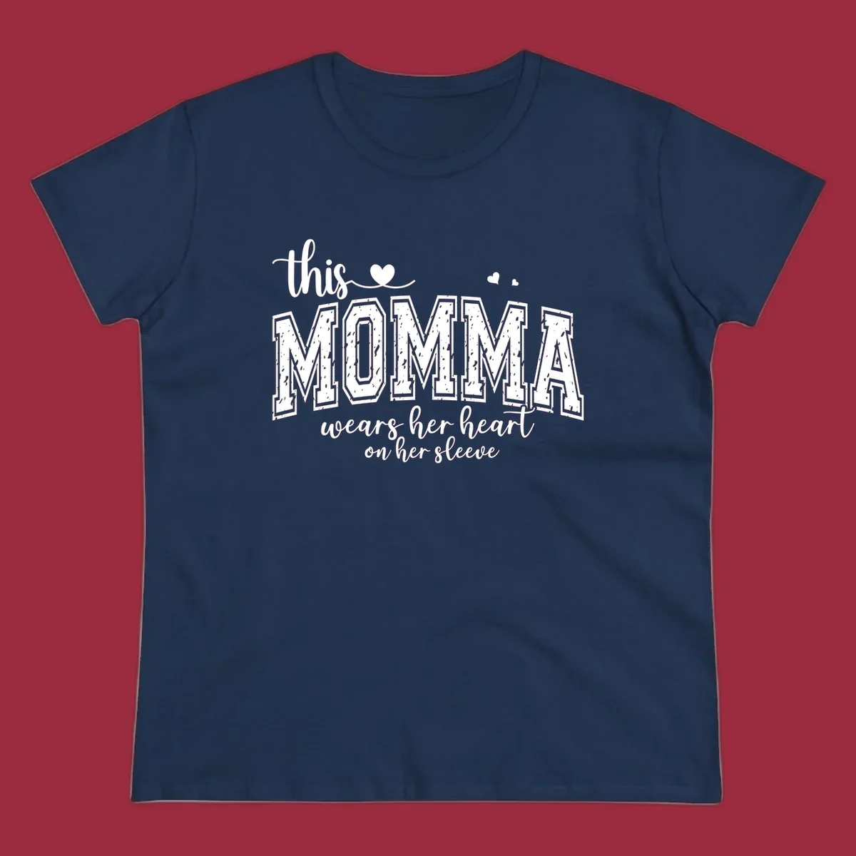Momma heart on sleeve typography design with script and varsity text and heart icons.