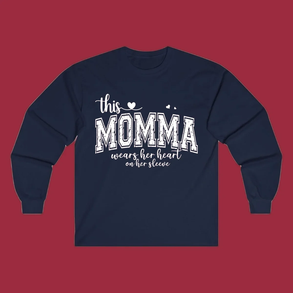 Momma heart on sleeve typography design with script and varsity text and heart icons.