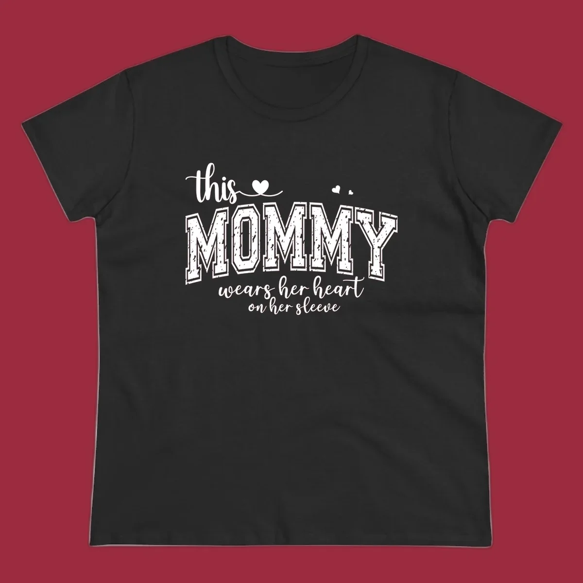 This Mommy Wears Her Heart On Her Sleeve text design with hearts.