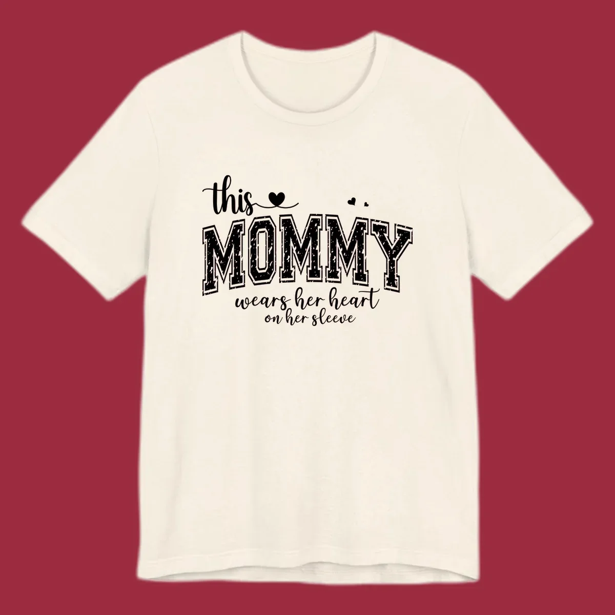 This Mommy Wears Her Heart On Her Sleeve text design with hearts.