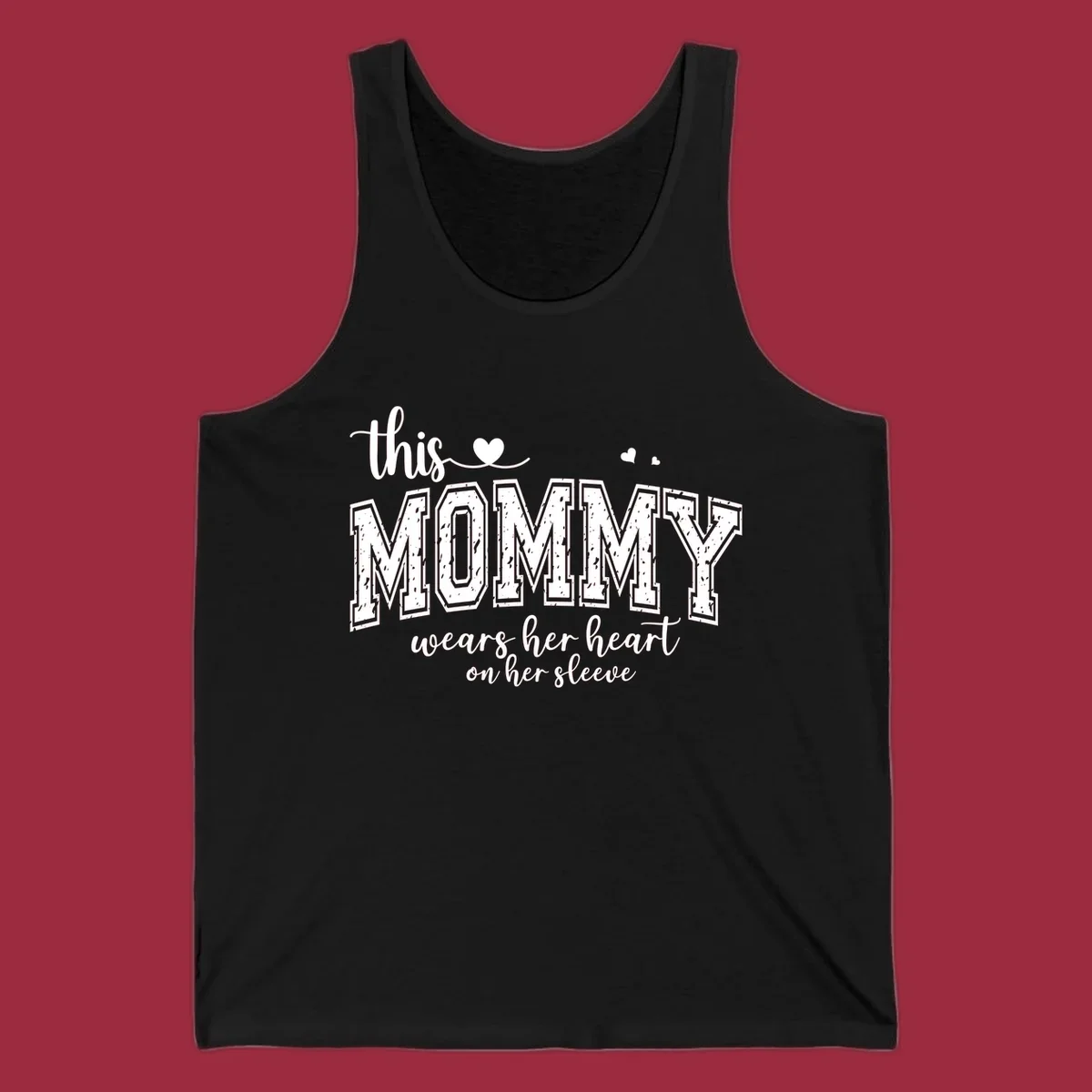 This Mommy Wears Her Heart On Her Sleeve text design with hearts.