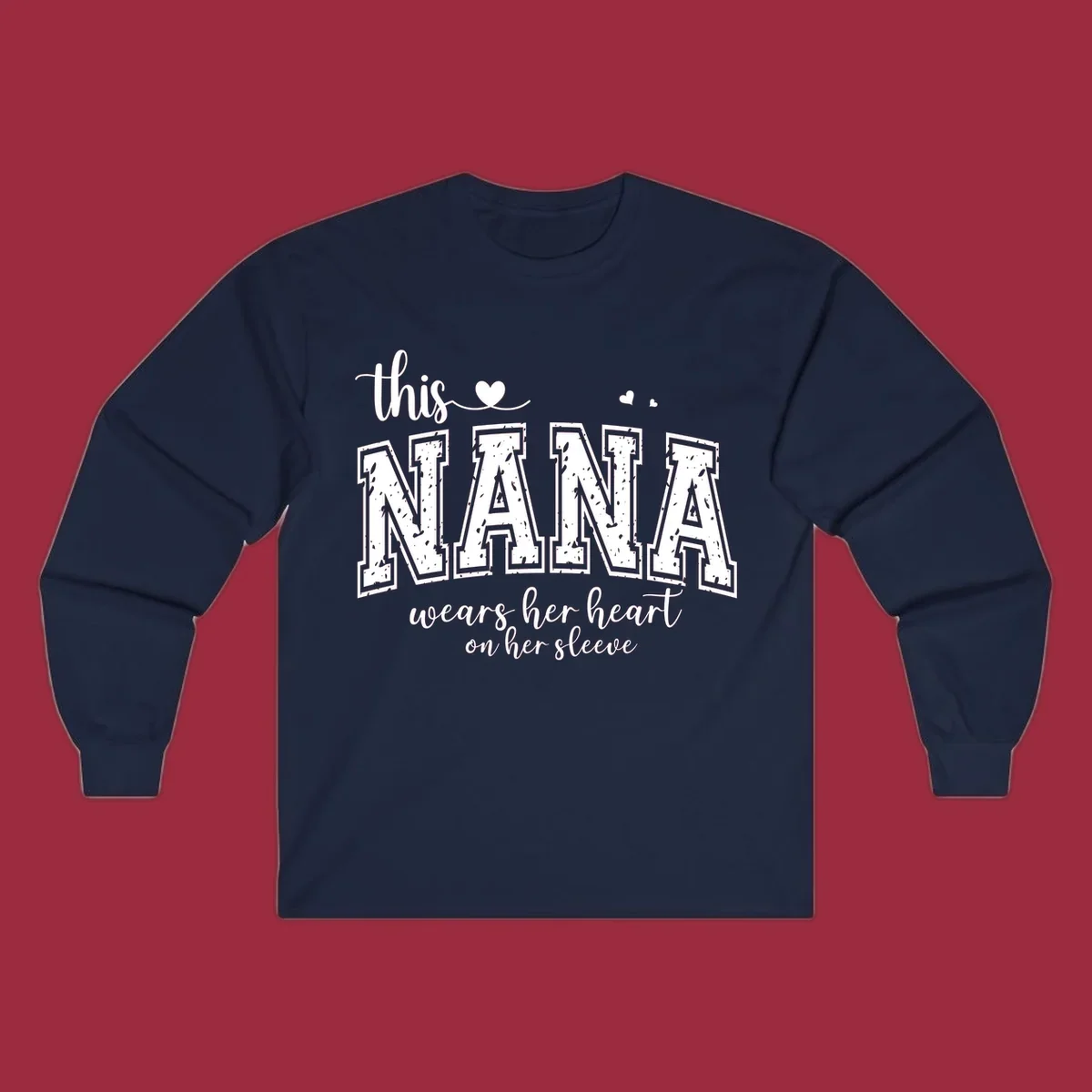 Text design for Nana that says 'this nana wears her heart on her sleeve' with heart accents.
