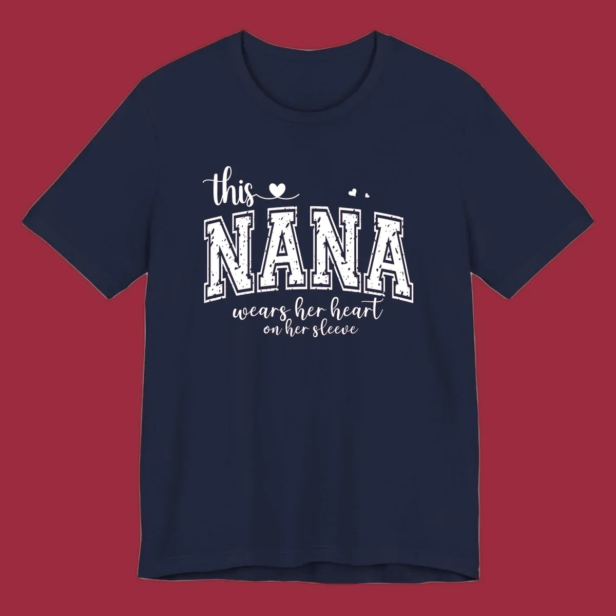 Text design for Nana that says 'this nana wears her heart on her sleeve' with heart accents.