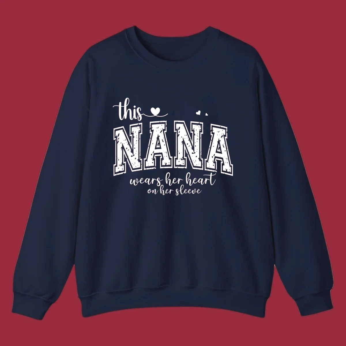 Text design for Nana that says 'this nana wears her heart on her sleeve' with heart accents.