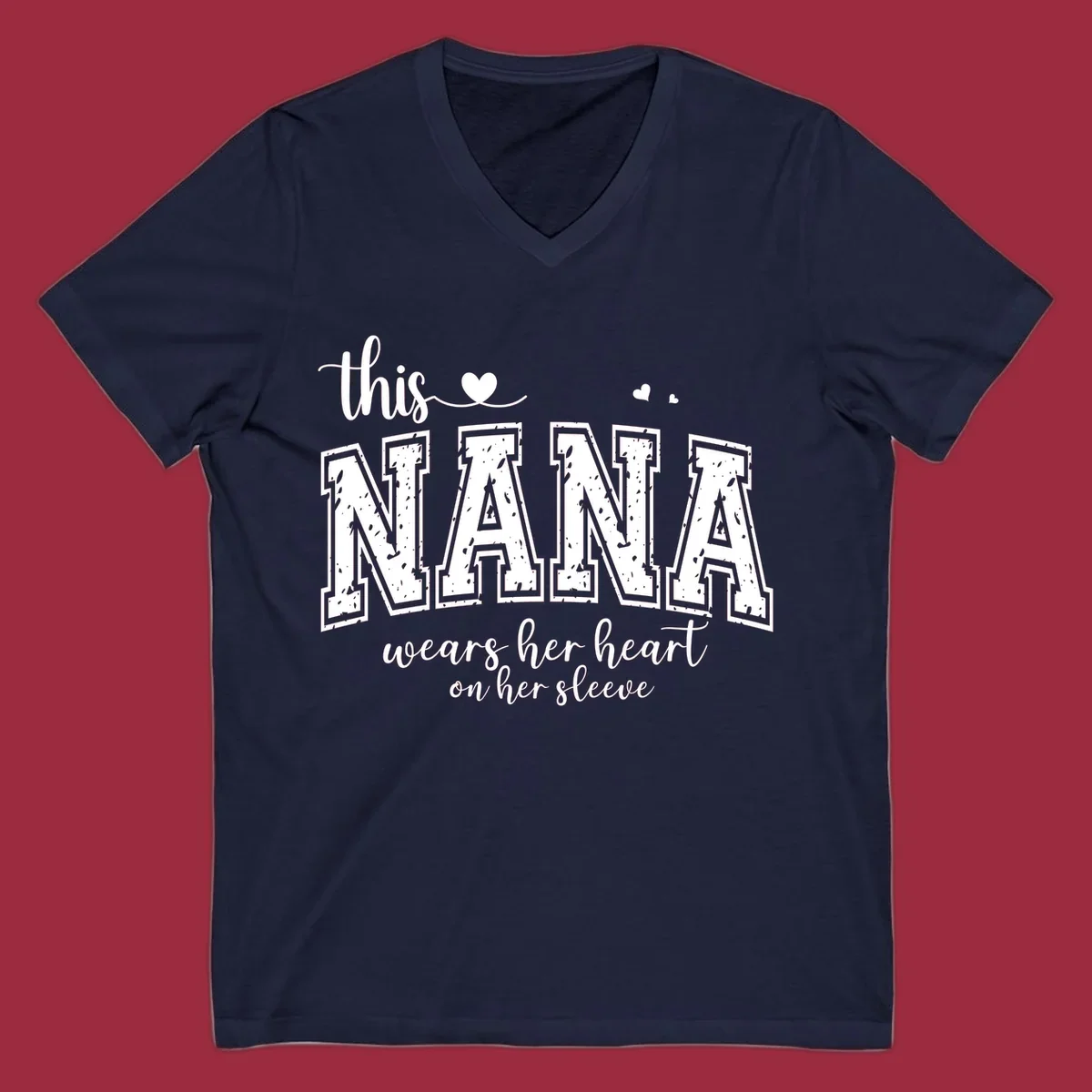 Text design for Nana that says 'this nana wears her heart on her sleeve' with heart accents.