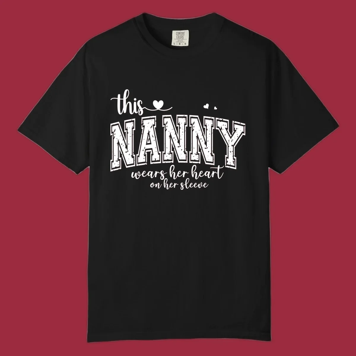 This Nanny Wears Her Heart On Her Sleeve typography design with hearts.