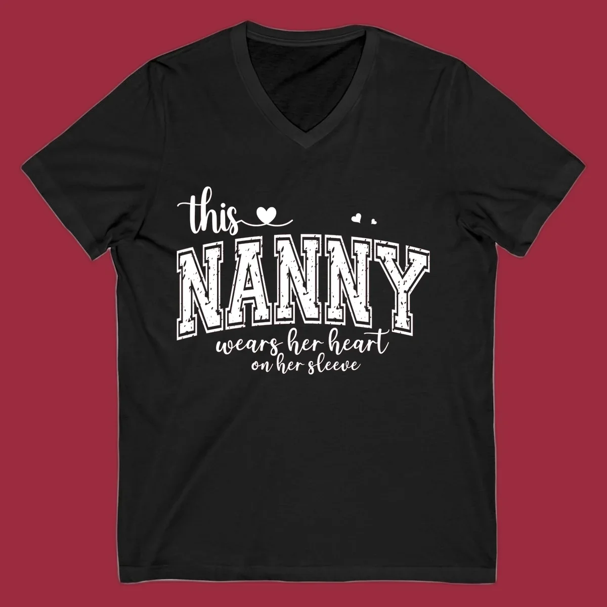 This Nanny Wears Her Heart On Her Sleeve typography design with hearts.
