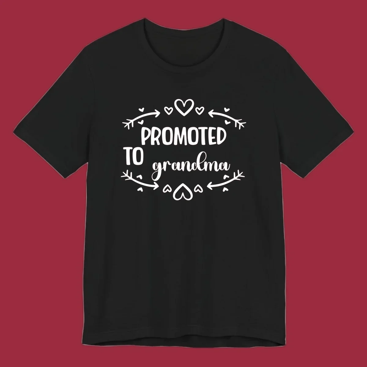 Promoted to Grandma text with hearts and arrows graphic.
