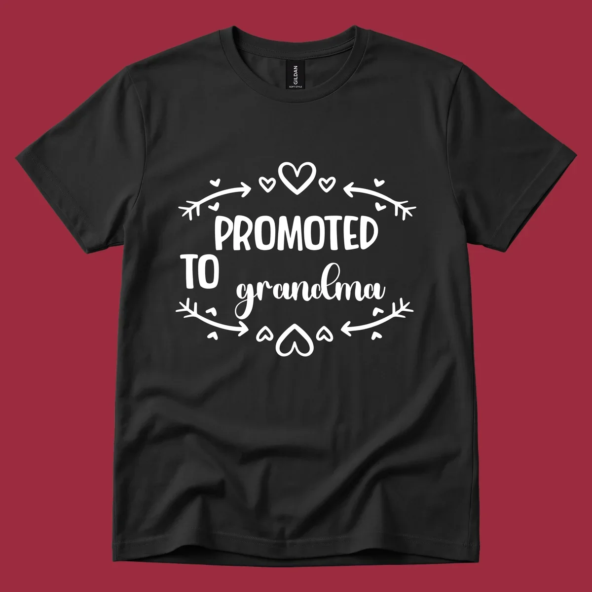 Promoted to Grandma text with hearts and arrows graphic.
