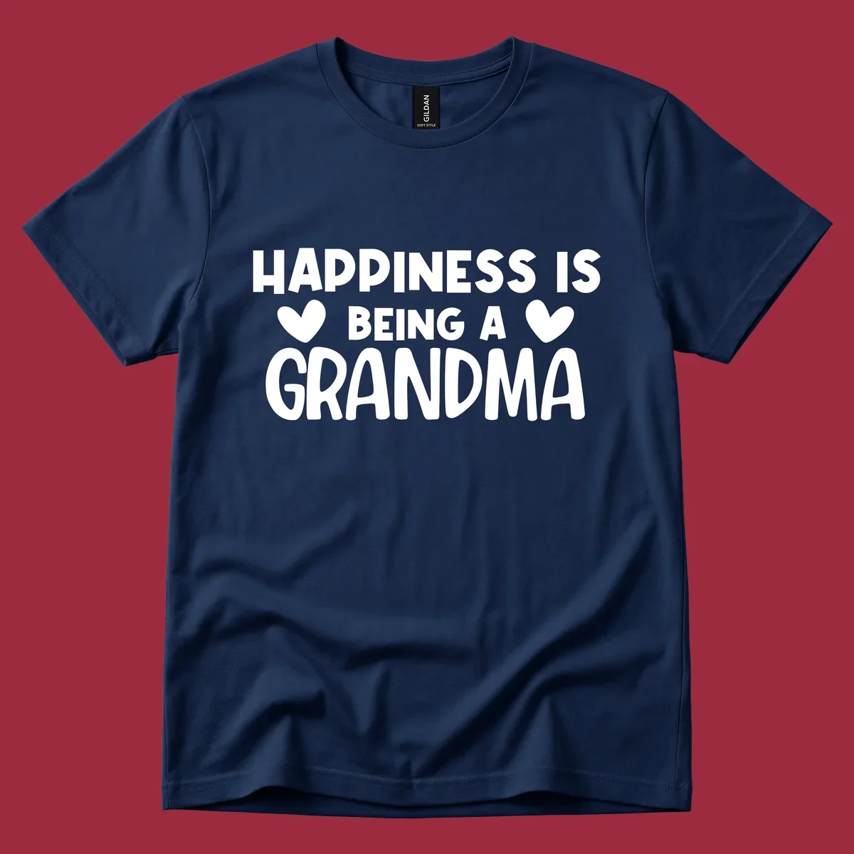 Happiness is being a grandma quote with heart graphics.