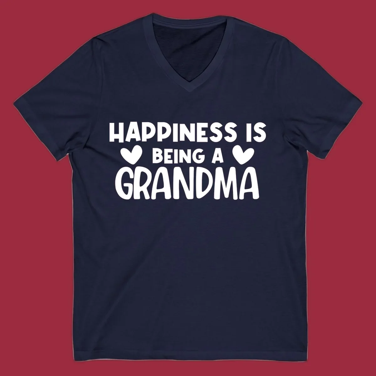 Happiness is being a grandma quote with heart graphics.