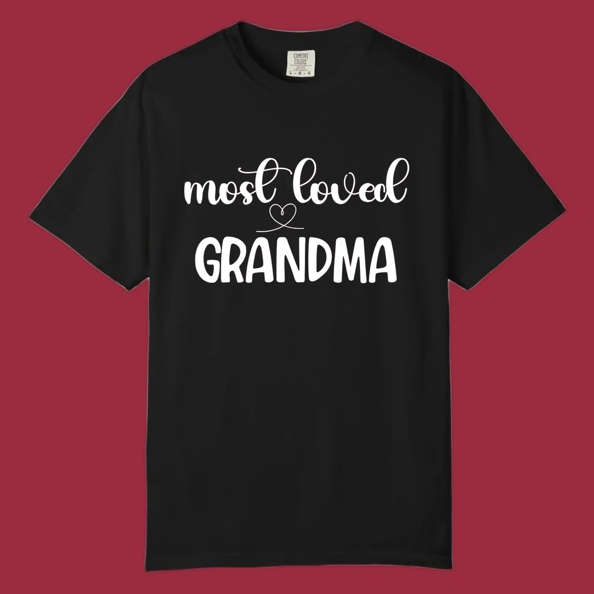 Most loved grandma typography design with a heart graphic.
