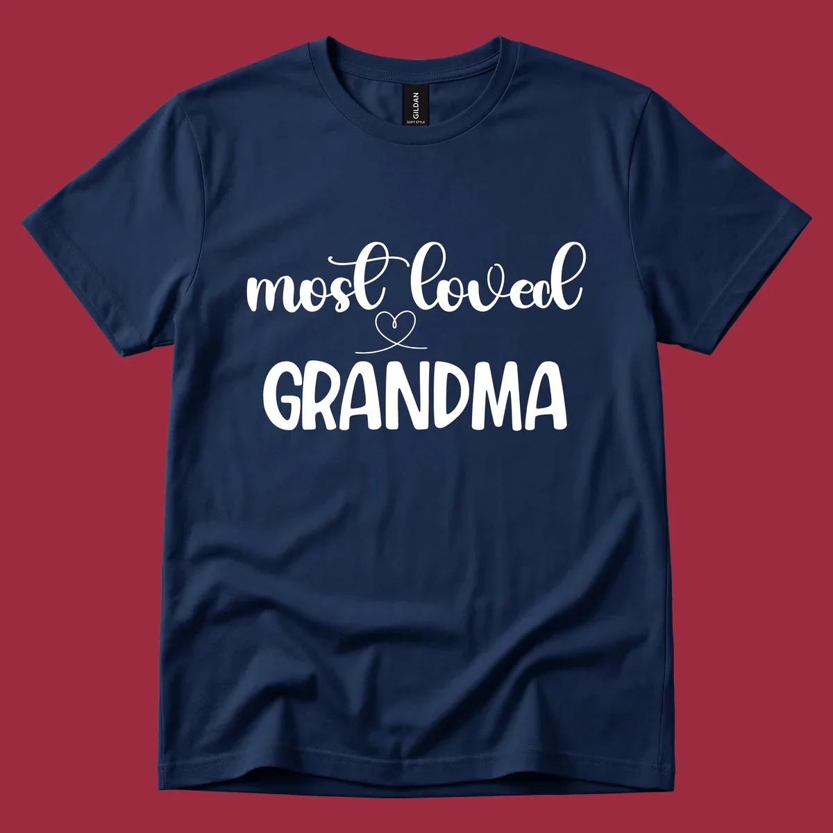 Most loved grandma typography design with a heart graphic.