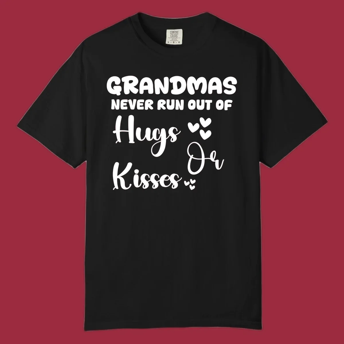 Grandma hugs and kisses typography design with heart accents.