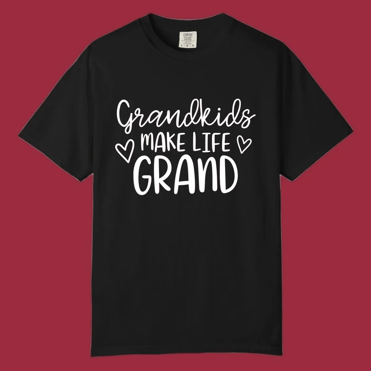 Grandkids Make Life Grand text with hearts, white on black and white.
