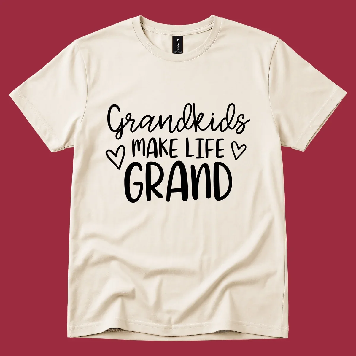 Grandkids Make Life Grand text with hearts, white on black and white.