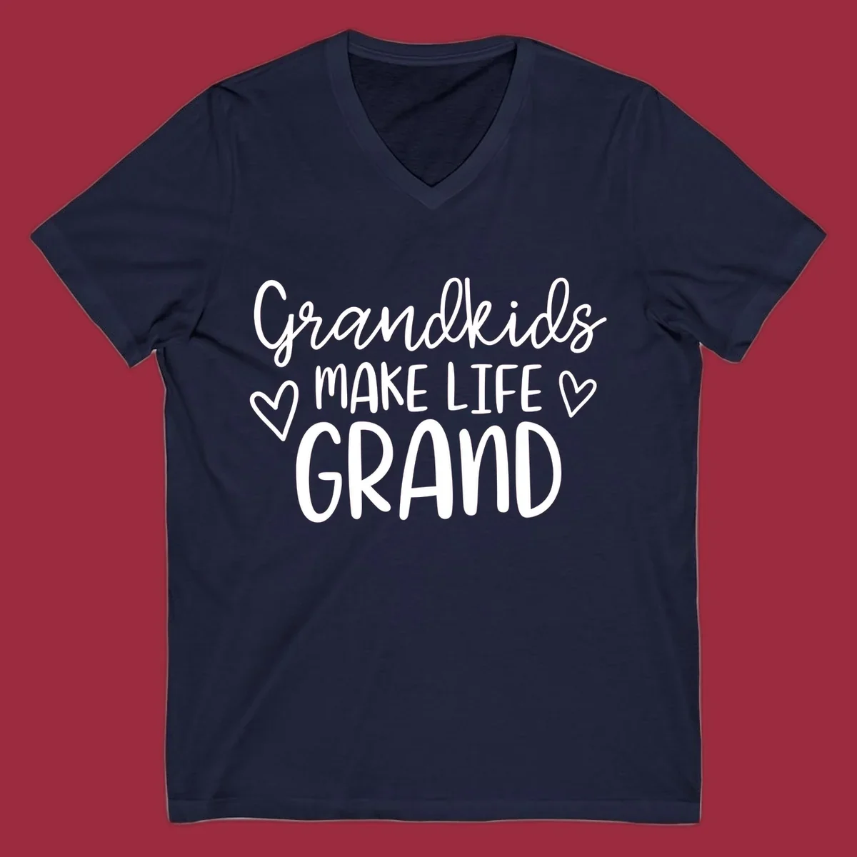 Grandkids Make Life Grand text with hearts, white on black and white.