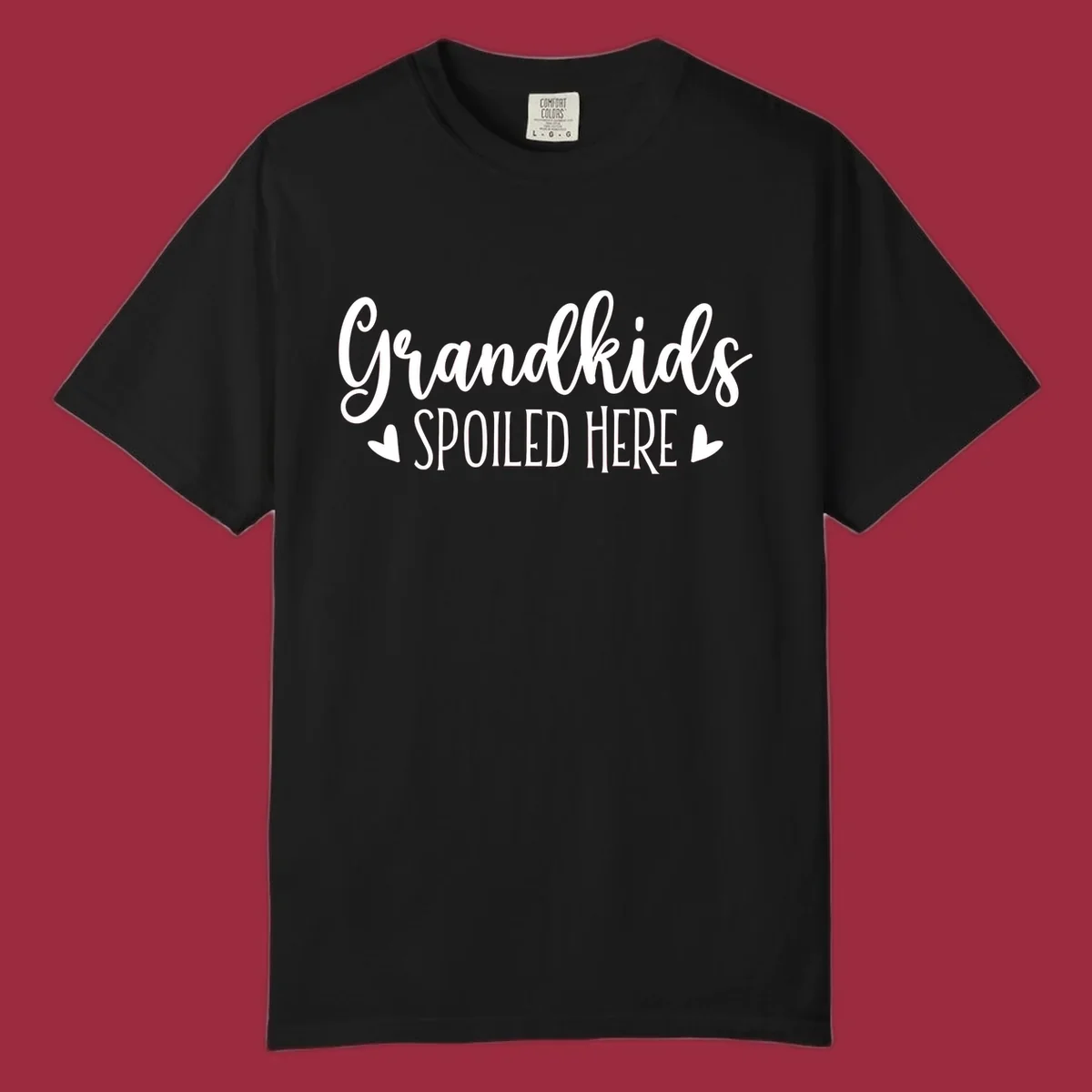 Grandkids Spoiled Here typography design with heart accents.