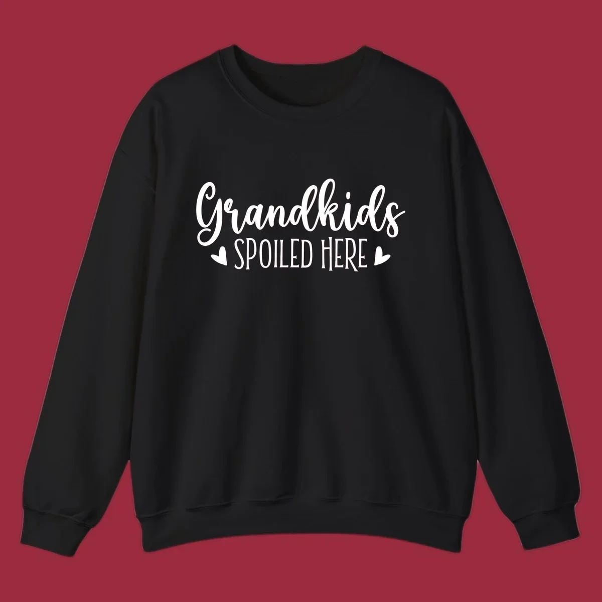 Grandkids Spoiled Here typography design with heart accents.
