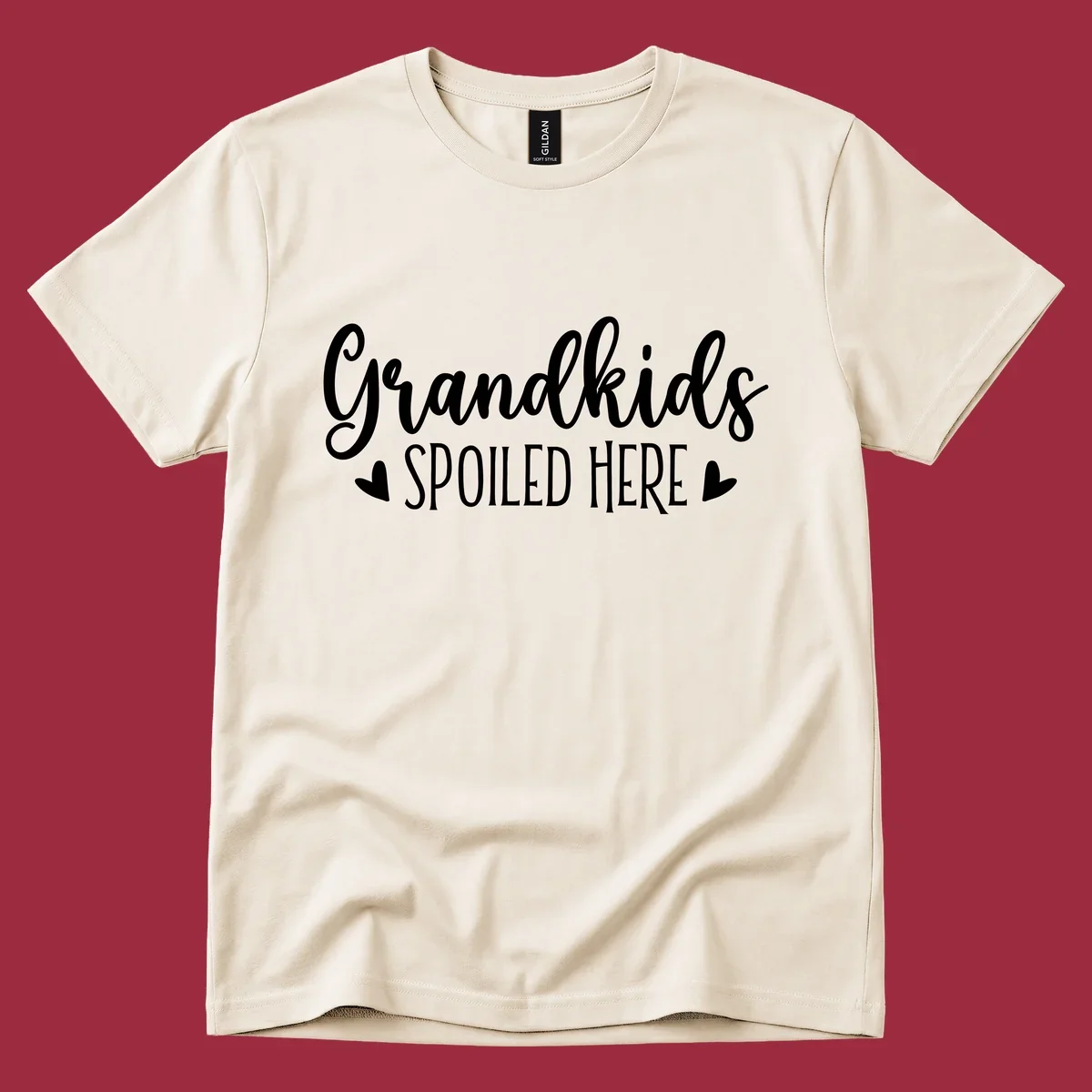 Grandkids Spoiled Here typography design with heart accents.