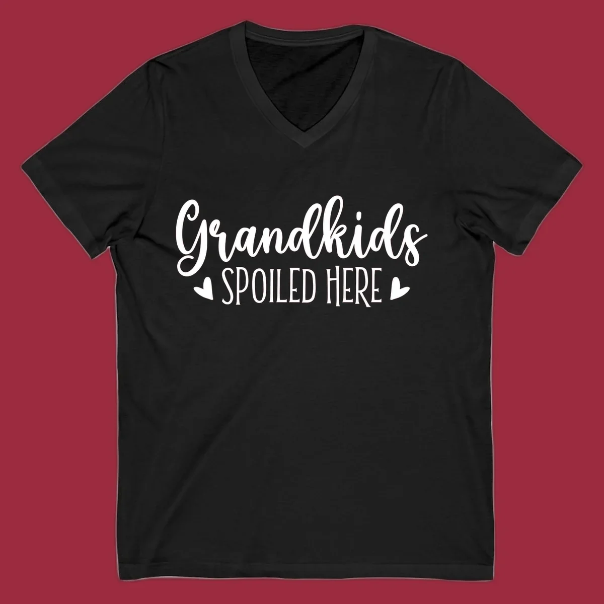 Grandkids Spoiled Here typography design with heart accents.