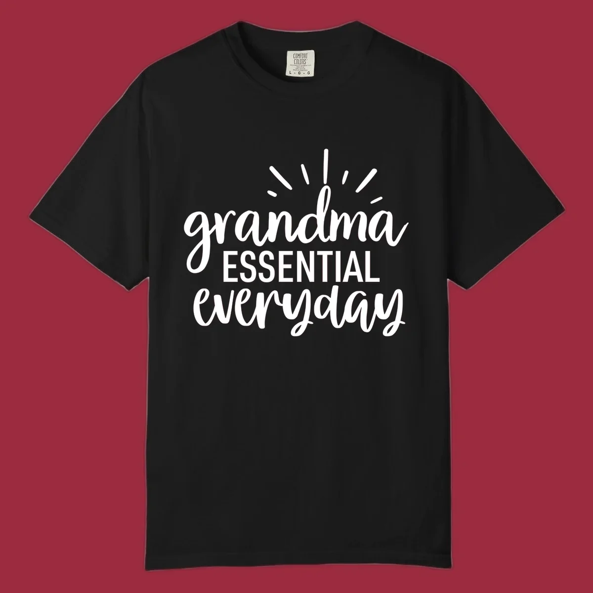 Grandma Essential Everyday text design with sun rays.