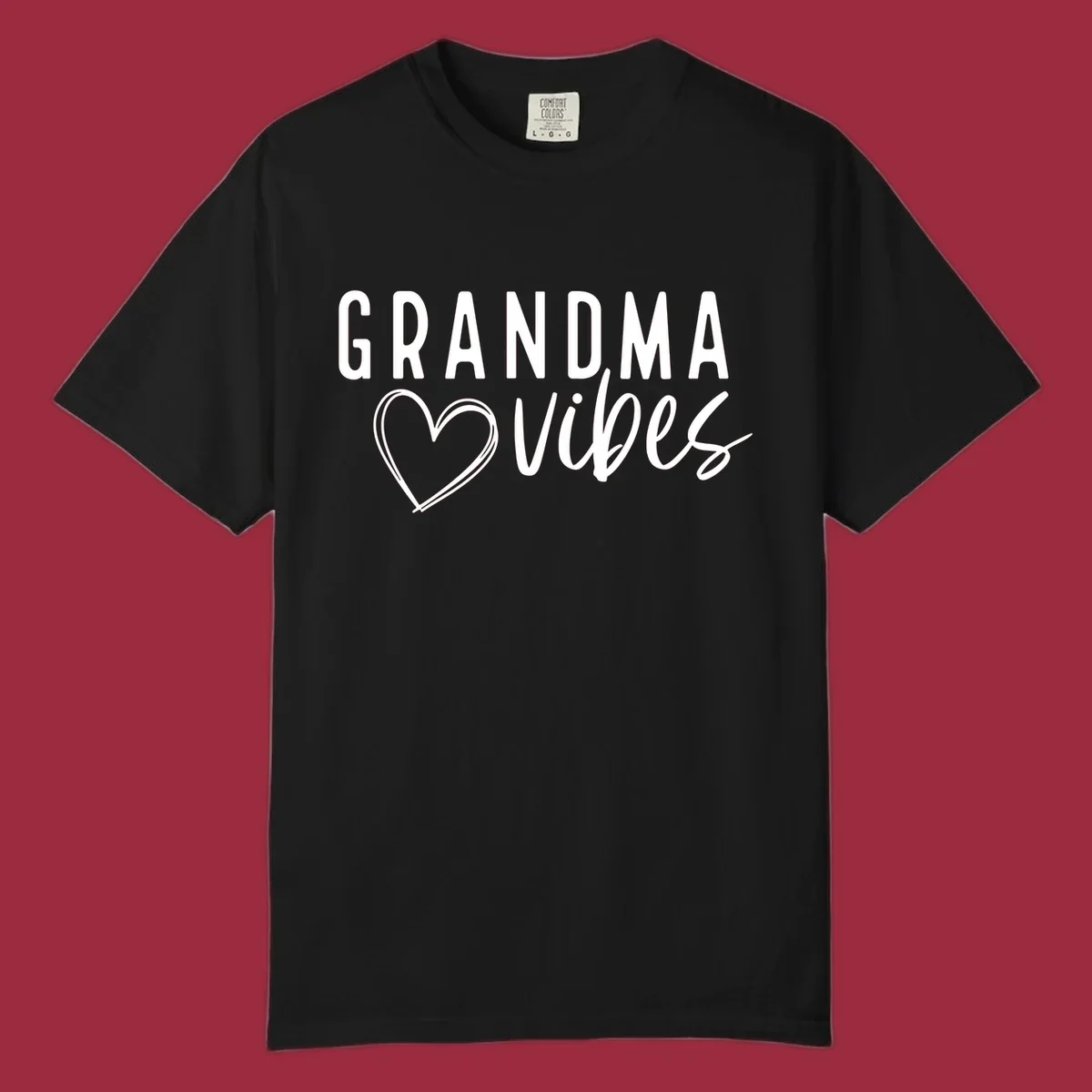 Grandma vibes text with a heart outline, white on black and black on white.