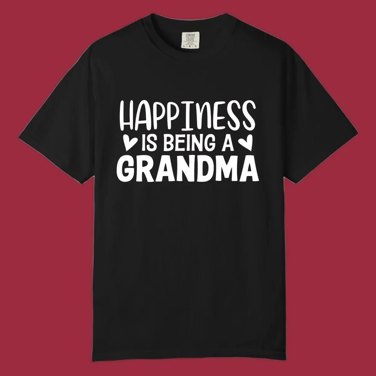 Happiness is being a grandma quote with hearts graphic.