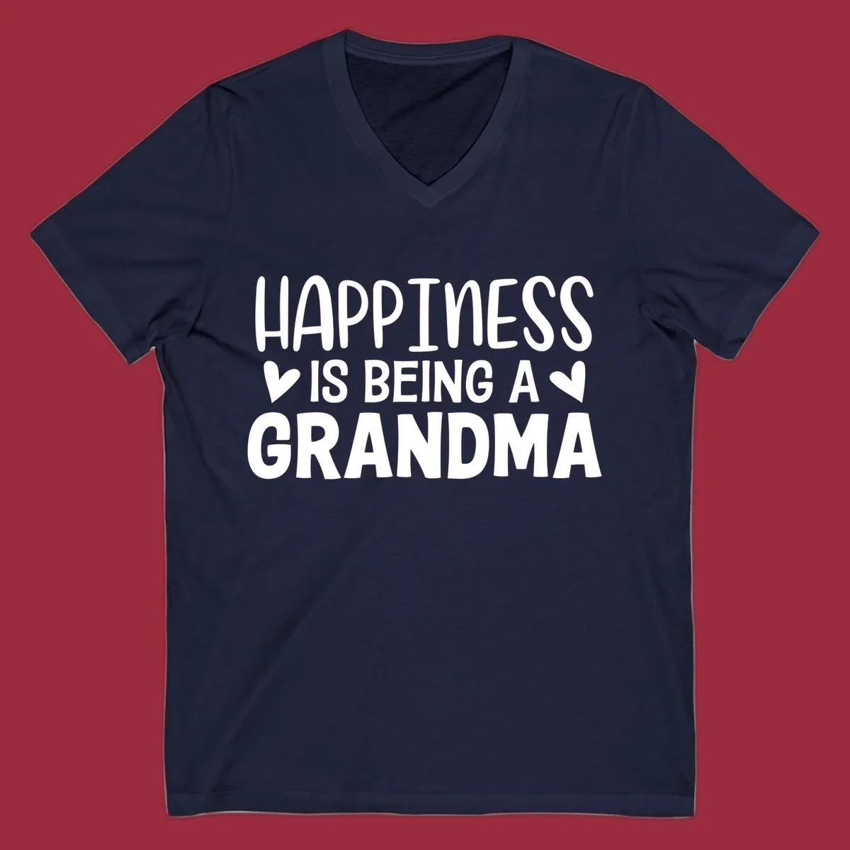 Happiness is being a grandma quote with hearts graphic.