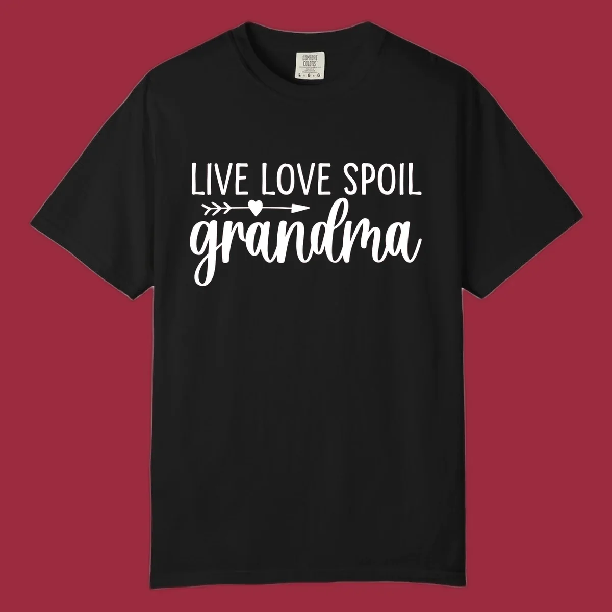 Live Love Spoil Grandma typography design with heart and arrow.