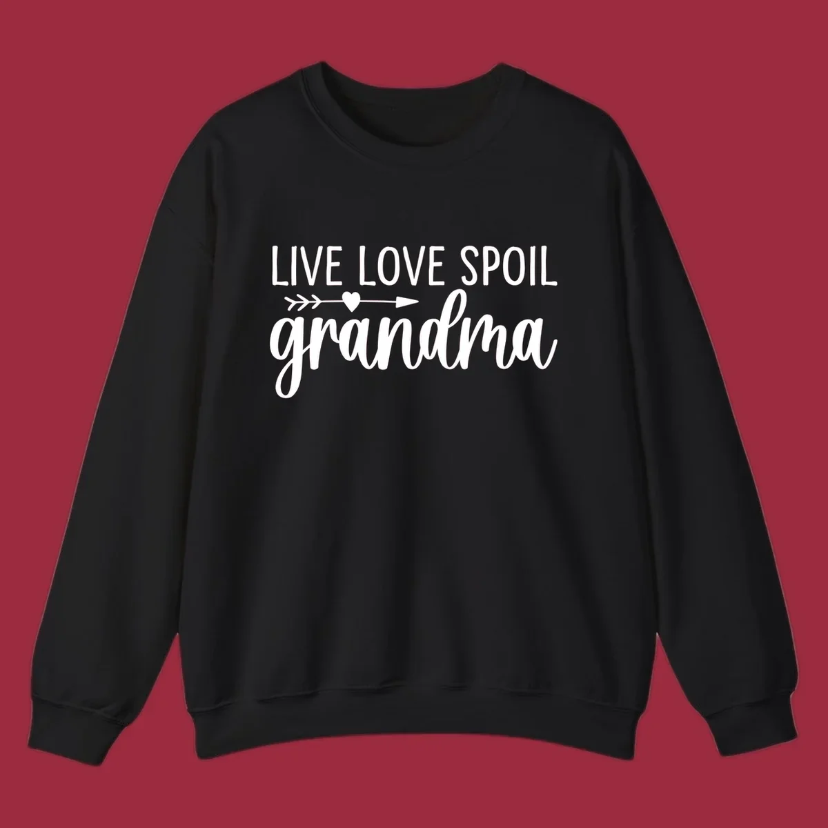 Live Love Spoil Grandma typography design with heart and arrow.