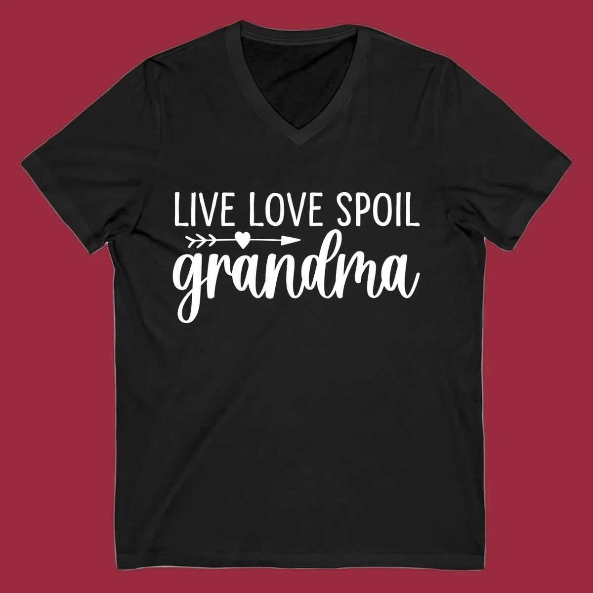Live Love Spoil Grandma typography design with heart and arrow.