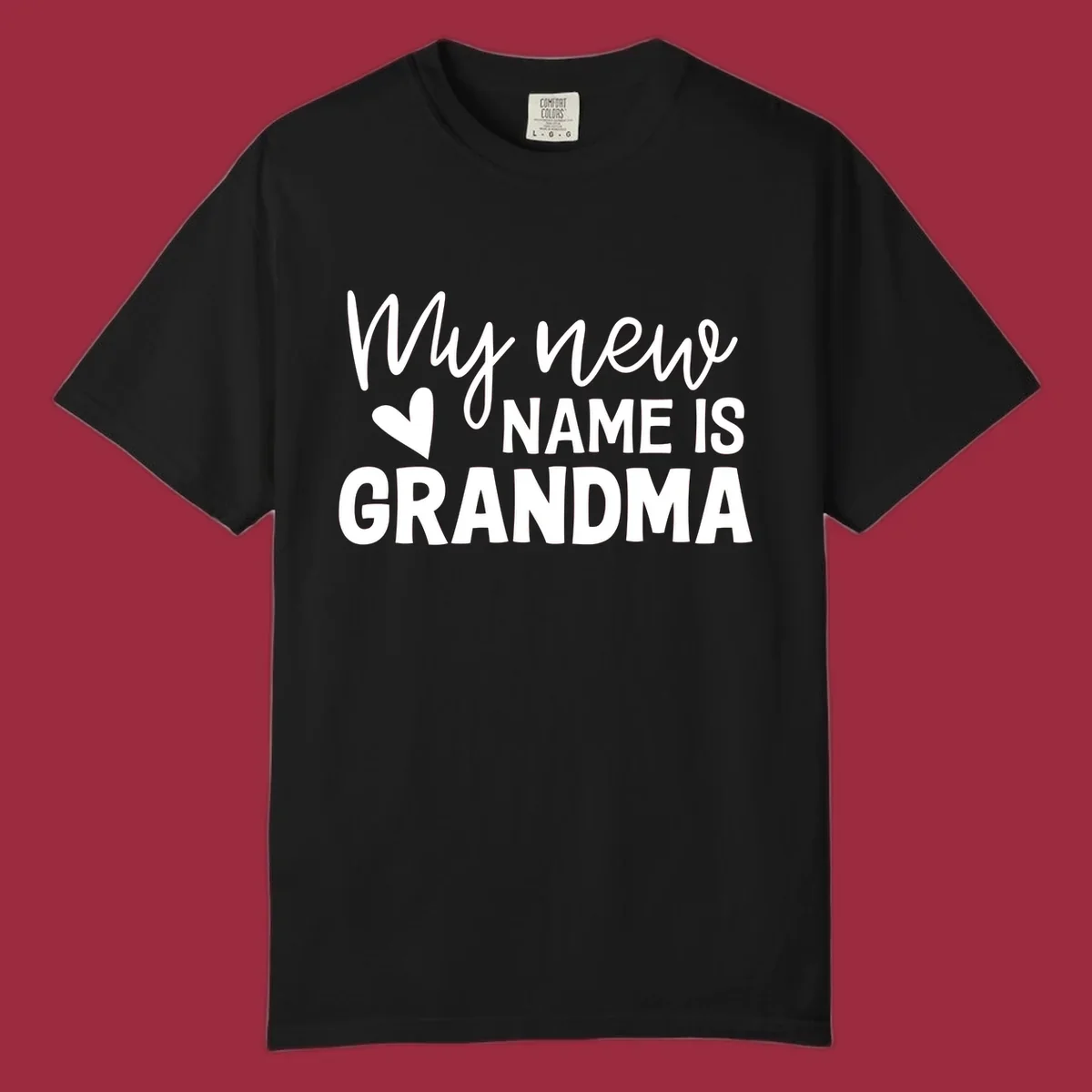 Text design announcing 'My new NAME IS GRANDMA' with a heart graphic.