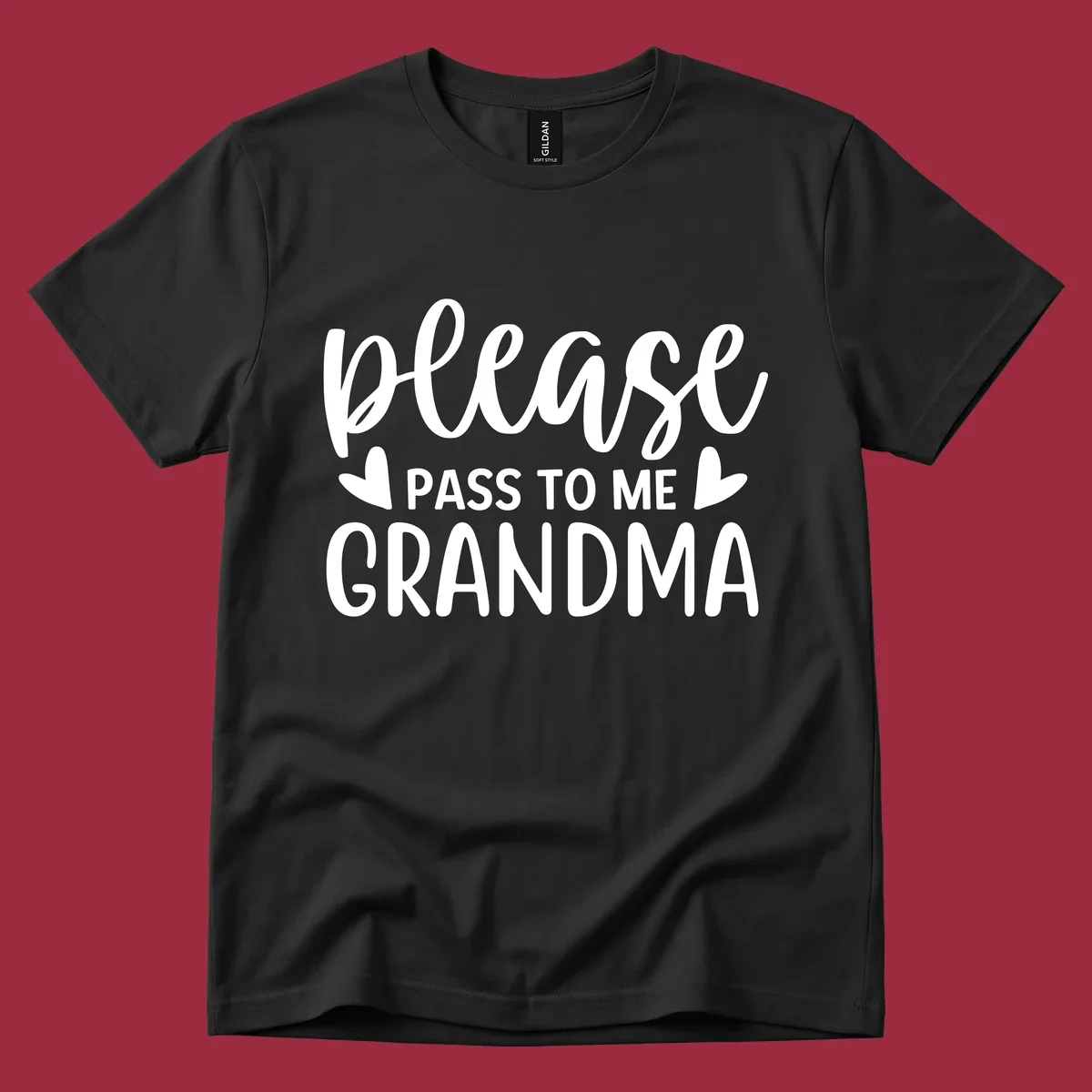 Grandma please pass me the snacks text design with heart accents.