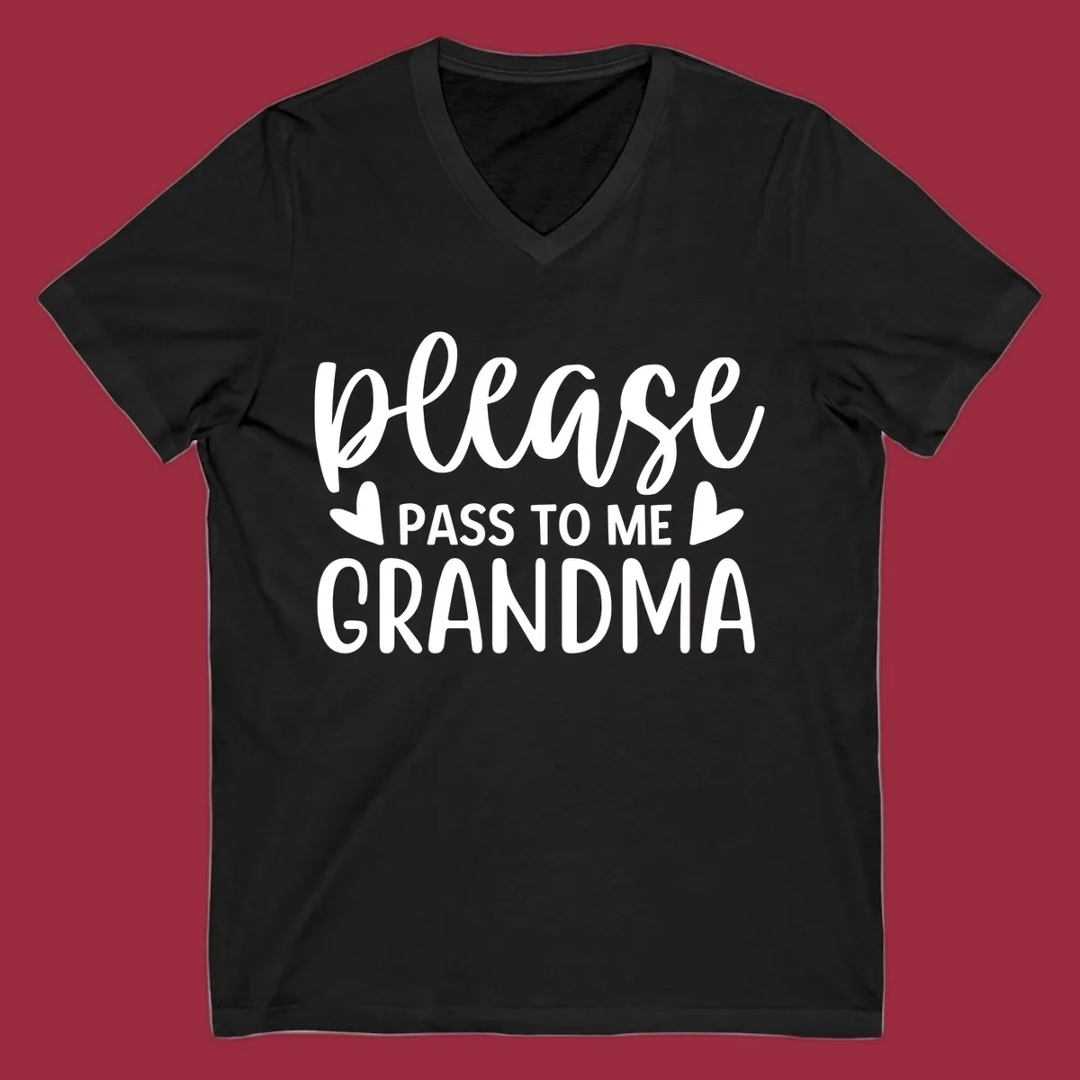 Grandma please pass me the snacks text design with heart accents.